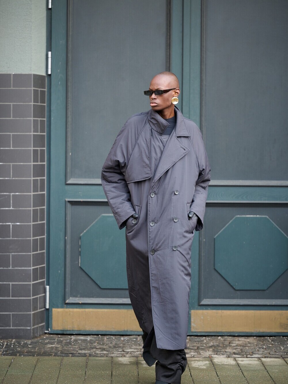 Insulated coat made of raincoat fabric